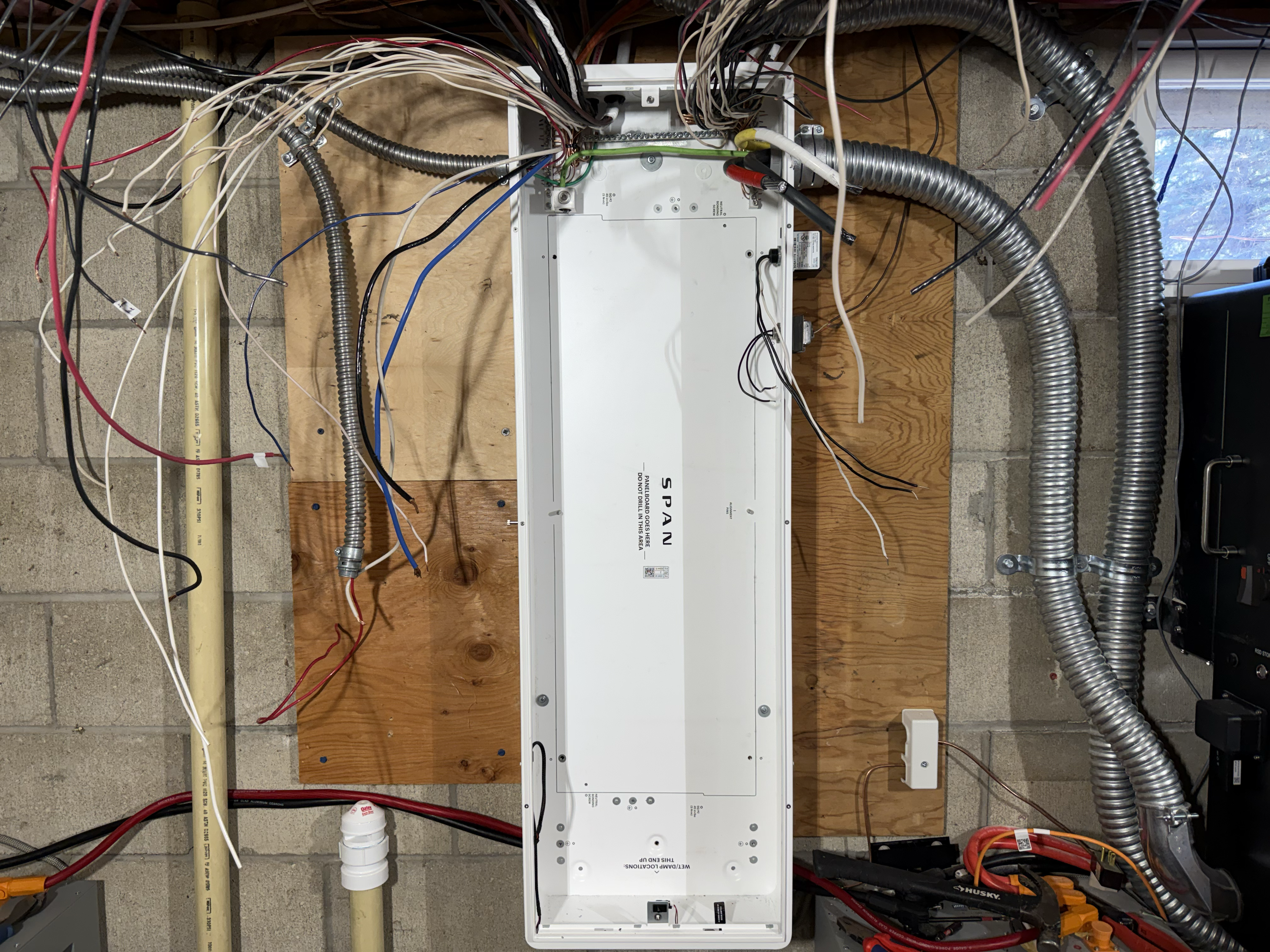 Wires pulled into panel, beginning organization