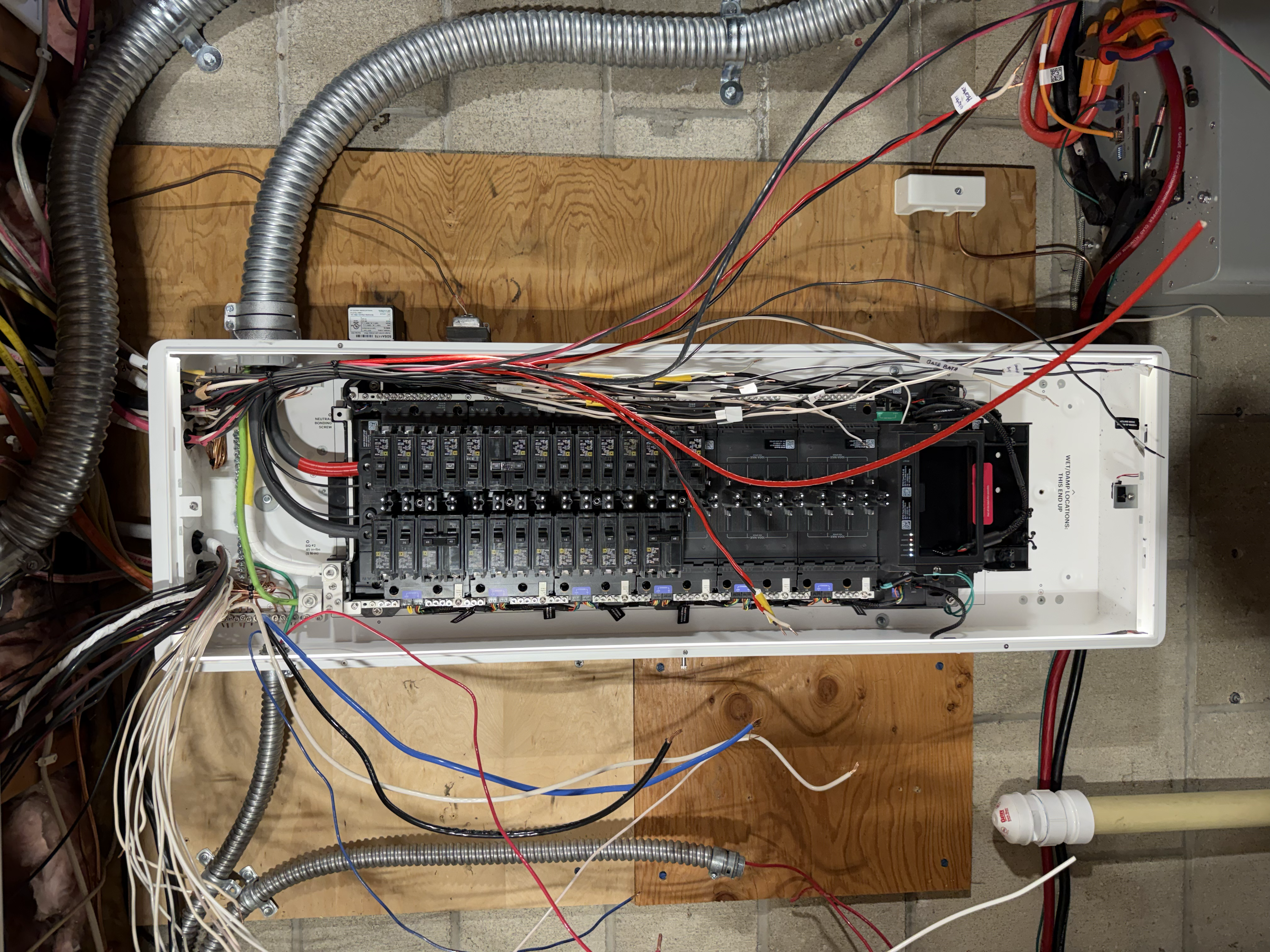 Breakers being installed, wires partially connected