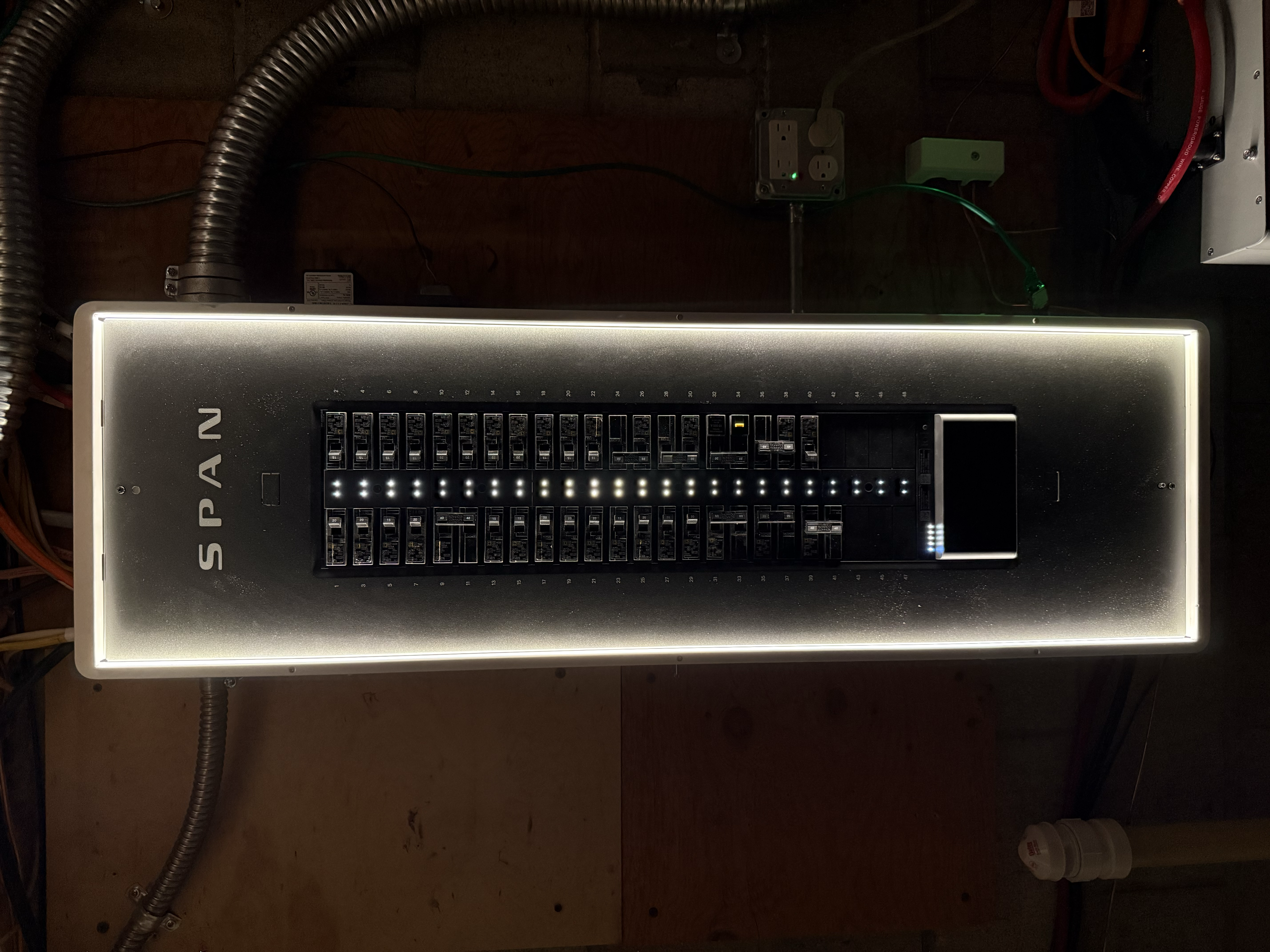 Span panel fully lit with circuit indicators active