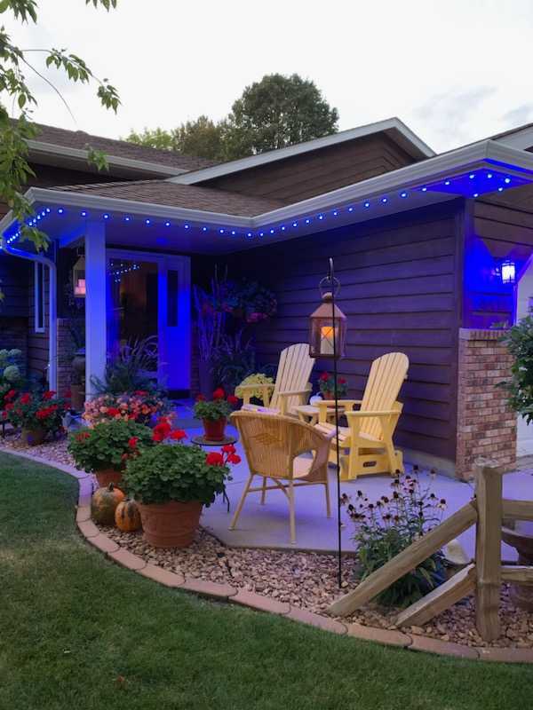Gemstone blue accent lighting on porch